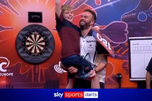 Heartwarming moments as Ross Smith celebrates title with his son